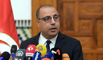 Tunisian PM sacks interior minister, baring tensions with president