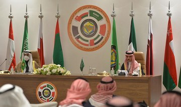 Saudi Foreign Minister Prince Faisal bin Farhan (R) and Secretary General of the Gulf Cooperation Council Nayef Al-Hajraf hold a press conference at the end of the GCC’s 41st summit, in the city of AlUla in northwestern Saudi Arabia on Jan. 5, 2021. (AFP)