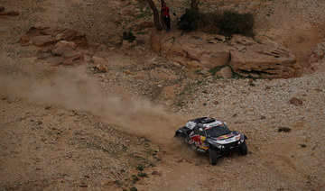 X-Raid Mini JCW Team's Stephane Peterhansel and Co-Driver Edouard Boulanger in action during stage 5. (Reuters/File Photo)