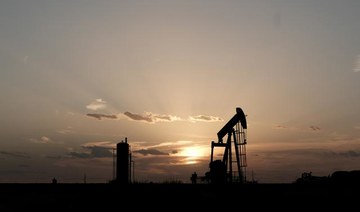 Oil hits 11-month highs on Saudi cuts, shrugs off US turmoil