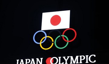 Japan presses on with Olympics preparations despite surging coronavirus cases