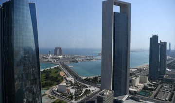 A general view taken on May 29, 2019 shows the sea front promenade in the Emirati capital Abu Dhabi with the ADNOC headquarters (Abu Dhabi National Oil Company) office complex (C) in the foreground. (AFP/File Photo)