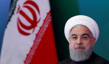 Ahmed Jahan Bozorgi, a cleric and member of an Islamic think tank, said Hassan Rouhani (pictured) could often not be reached by members of the Iranian Cabinet because he was at home smoking opium. (Reuters/File Photo)