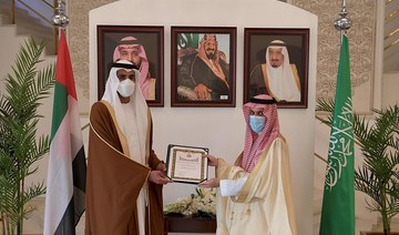 The Order of King Abdulaziz Second Class was handed to Sheikh Shakhbout by Saudi Foreign Minister Prince Faisal bin Farhan during a meeting in Riyadh. (SPA)
