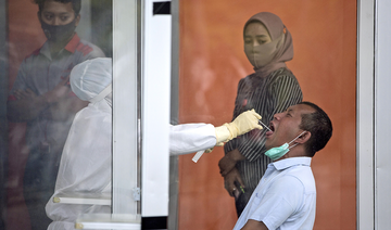 Indonesia gets tough on COVID-19 vaccine skeptics as phase two of inoculations begins