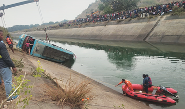 At least 37 dead as Indian bus veers off road into canal