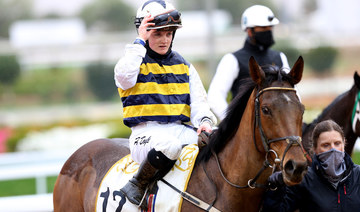 Hollie Doyle made history on Saturday by becoming the first female jockey to win a race on Saudi Cup day. (Reuters)