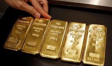 Gold rises 1% on weaker dollar, US stimulus cheer