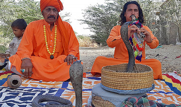 In Pakistan’s Thar desert, one snake charmer struggles to keep a dying art alive 
