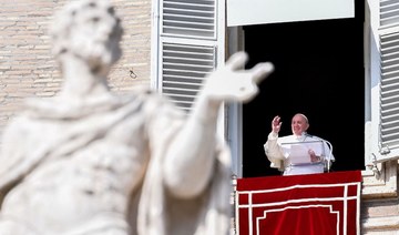 Pope says will make Iraq trip despite rocket attack