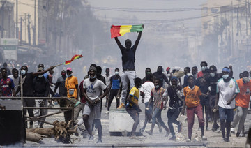 Rioters ransack police stations and buildings as Senegal opposition steps up protests