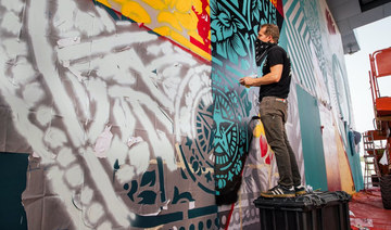 US street artist behind iconic Obama poster unveils first Middle East mural