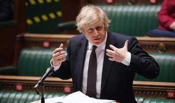 Britain’s Prime Minister Boris Johnson attending Prime Minister’s Questions (PMQs) in a socially distanced, hybrid session at the House of Commons, in London on March 17, 2021. (AFP PHOTO/Jessica Taylor/UK Parliament)