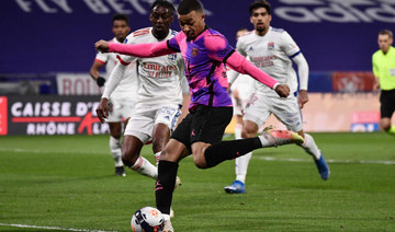 PSG beat Lyon to go top in France as Mbappe scores 100th Ligue 1 goal