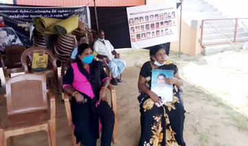 Sri Lankans wait for lost relatives as UN begins war crimes probe