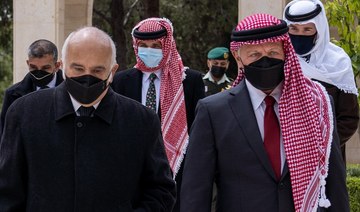 A handout picture released by the Jordanian Royal Palace on April 11, 2021 shows Jordanian King Abdullah II (R), Prince Hassan Bin Talal (L) and Prince Hamzah (C) arriving at the Raghadan Palace in the capital Jordan. (AFP) 
