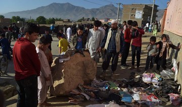 Afghanistan mourns 60 schoolgirls killed in deadliest attack in years