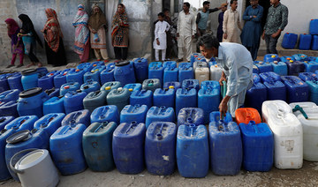Pakistan’s water bearers quench thirst in Ramadan, but fear for their trade 