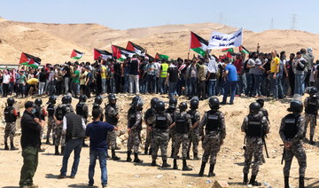 Jordanian police disperse protesters near border with West Bank