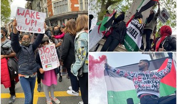 Protesters carried placards reading “Stop Bombing Gaza” and chanted “Free Palestine” as they marched toward the Israeli Embassy. (AN Photo/Lauren Lane)