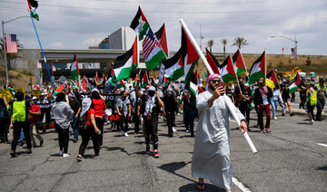 People demonstrate in Los Angeles on May 15, 2021 in support of Palestinians under attack by Israeli occupation forces. (AFP / Patrick T. Fallon)