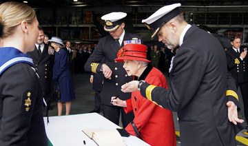 Queen Elizabeth visits navy carrier ahead of deployment