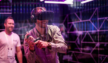An attendee tries out the new Oculus Quest Virtual Reality (VR) gaming system at the Facebook F8 Conference at McEnery Convention Center in San Jose, California. (File/AFP)