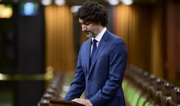 Prime Minister Justin Trudeau takes part in a moment of silence in the House of Commons on Parliament Hill in Ottawa on Tuesday, June 8, 2021 in response to the recent events in London, Ontario. (AFP)