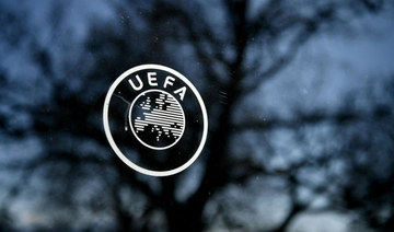 UEFA pauses Super League rebels case; English clubs fined