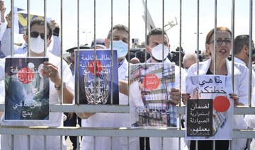 The ‘White Shirts’ organization, which includes doctors, pharmacists, dentists, nurses and laboratories, holds a sit-in in the interior courtyard of the Ministry of Health on Friday. (Supplied)