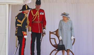 After charming leaders, Queen Elizabeth sits back for parade