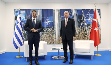 At NATO, Turkey hails its revival of dialogue with Greece