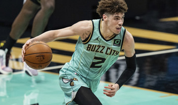Charlotte Hornets guard LaMelo Ball was picked as 2021 NBA Rookie of the Year by a global panel of 100 writers and broadcasters who cover the league. (AP Photo)