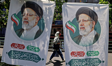 Iranians nonchalant as regime opens poll