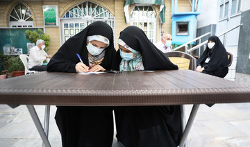 Many voters, including Ahmadinejad, boycott ‘sham’ Iran election