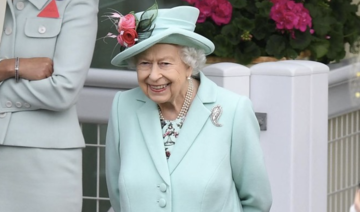 UK’s Queen Elizabeth II beams as she returns to Ascot after COVID-19 hiatus