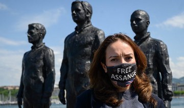 English lawyer and partner of Wikileaks founder Julian Assange, Stella Morris wearing a facemask reading: "Free Assange." (AFP)
