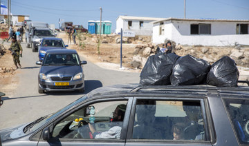 Israeli settlers leave West Bank outpost after government deal