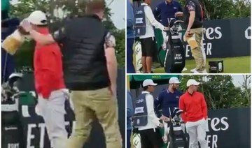 Waiting to start his second round alongside US Open champion Jon Rahm and American Justin Thomas, McIlroy watched on in bemusement. (Screenshot/Twitter)