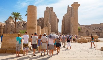 Tourists on a guided tour in the Temple of Karnak in Luxor. (Shutterstock/File Photo)