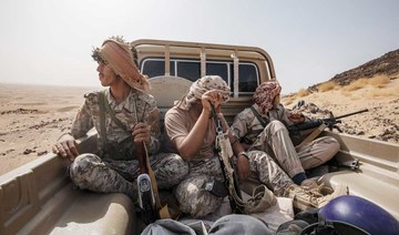 Yemeni fighters leave after clashes with Houthi rebels on the Kassara front line near Marib, Yemen, June 20, 2021. (AP)