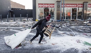 Stores and warehouses in South Africa were hit by looters on July 13, for a fifth day running despite the troops President Cyril Ramaphosa deployed to try to quell unrest that has claimed 72 lives. (AFP)