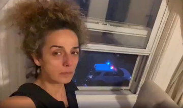 Iranian-American journalist Masih Alinejad shows an FBI car guarding outside her Brooklyn apartment after federal authorities unveiled an alleged plot by Iranian intelligence agents to abduct her. (Reuters)
