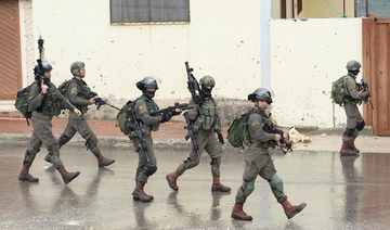 Israel troops arrest dozens of Palestinian university students