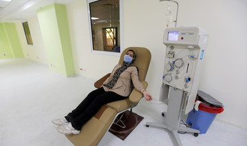 A patient who has recovered from the coronavirus disease (COVID-19) donates her plasma for research purposes, at the National Blood Transfusion Services in Cairo, Egypt. (REUTERS file photo)