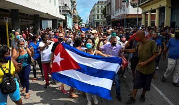Thousands of Cubans protested over shortages of basic goods, limits on civil liberties and the government’s handling of a surge in COVID-19 infections. (AFP)