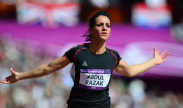 Iraq’s Dana Hussein (then Abdul Razak) competing in the women's 100m heats at the London 2012 Olympic Games. (AFP/File Photo)