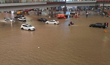 Villagers flee fresh floods in central China as typhoon approaches