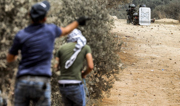 Palestinian shot in clashes with Israeli troops dies