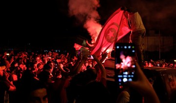 Tunisians celebrate government ousting with cheers, fireworks